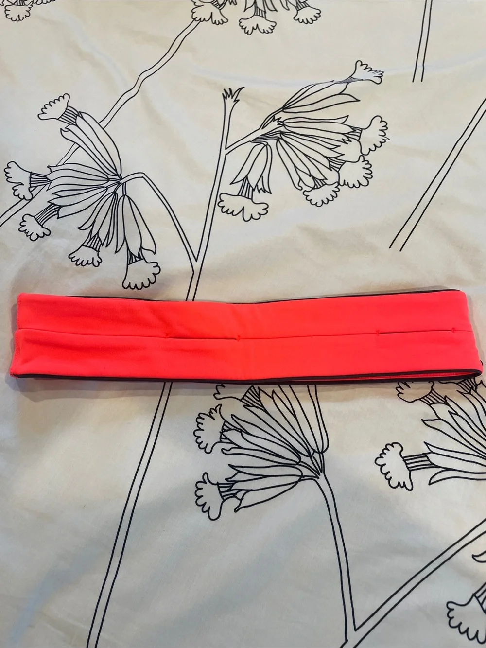 FlipBelt Neon Coral Running Headband